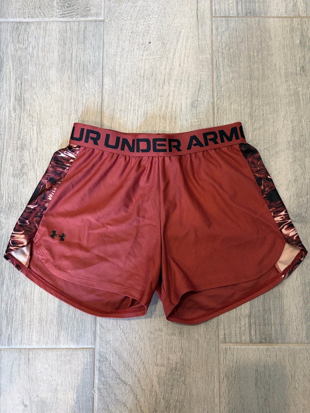 Under Armour Women's Rust Red Performance Shorts with Patterned Side Panels